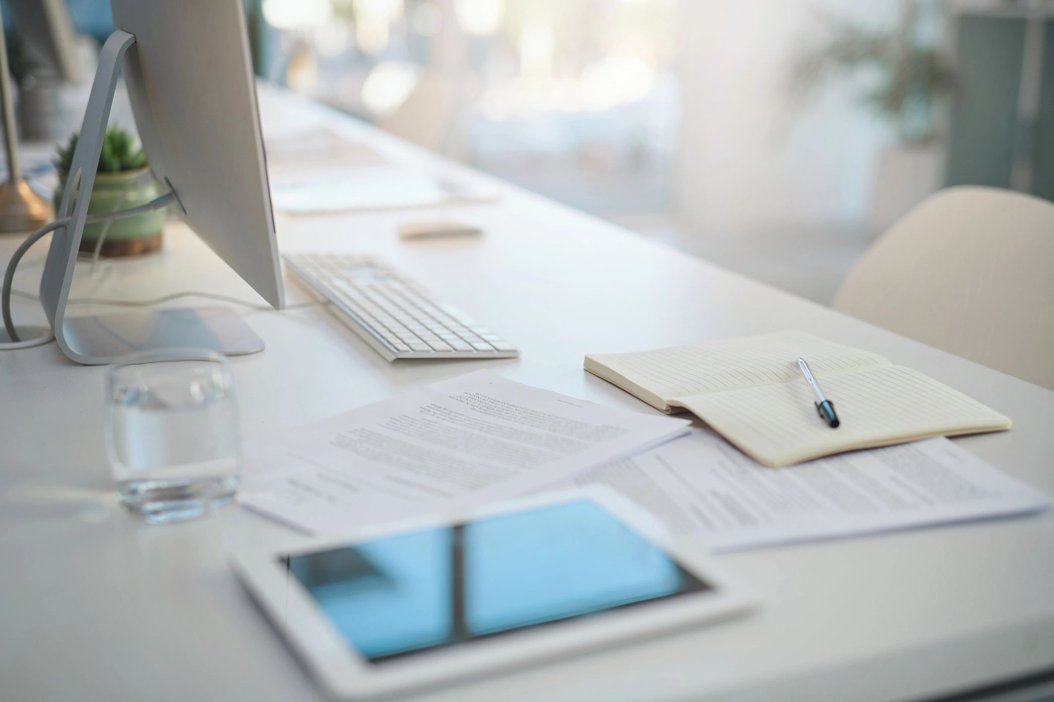 Desk with documents representing administrative recordkeeping