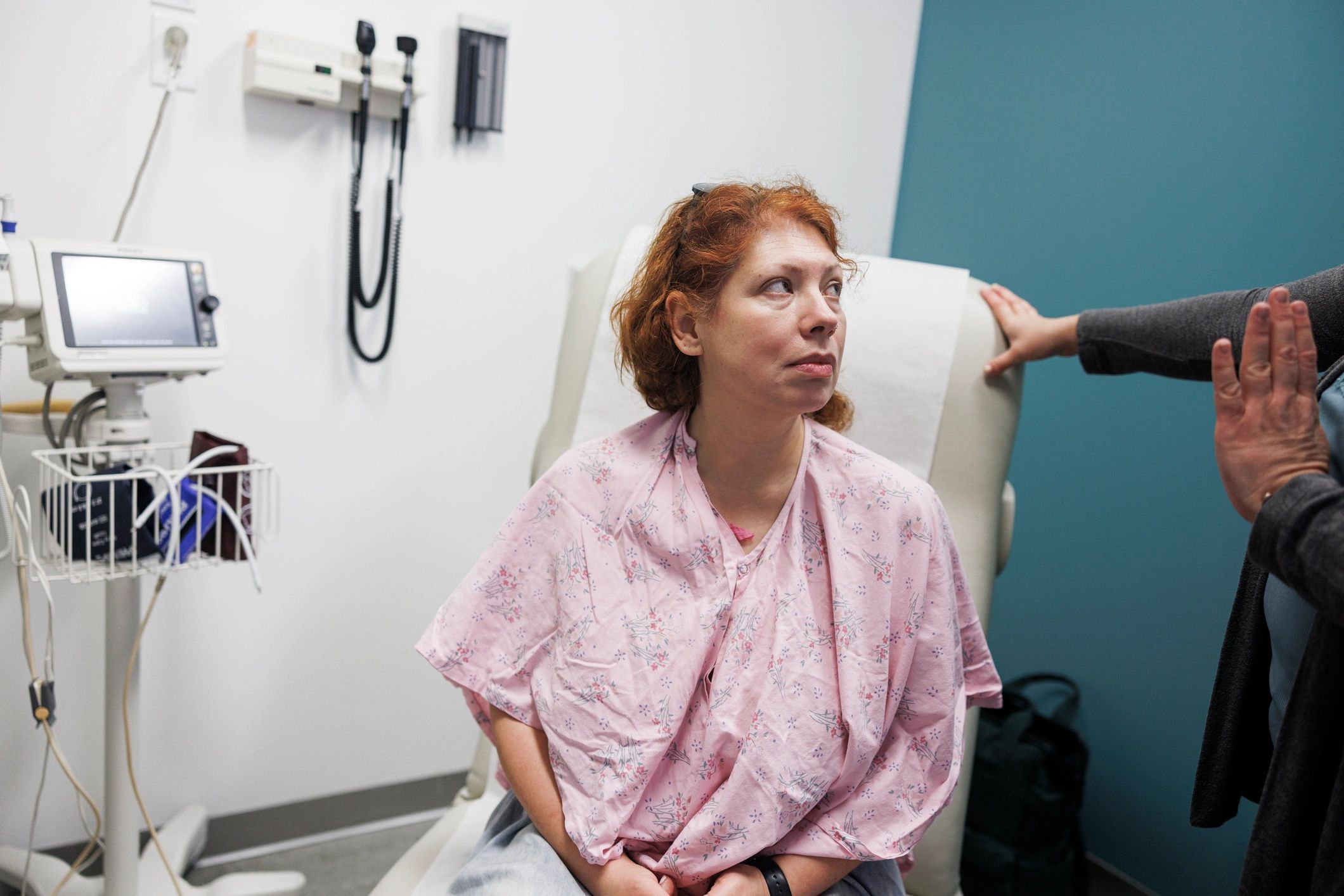 Patient speaking with a healthcare provider during a clinic visit